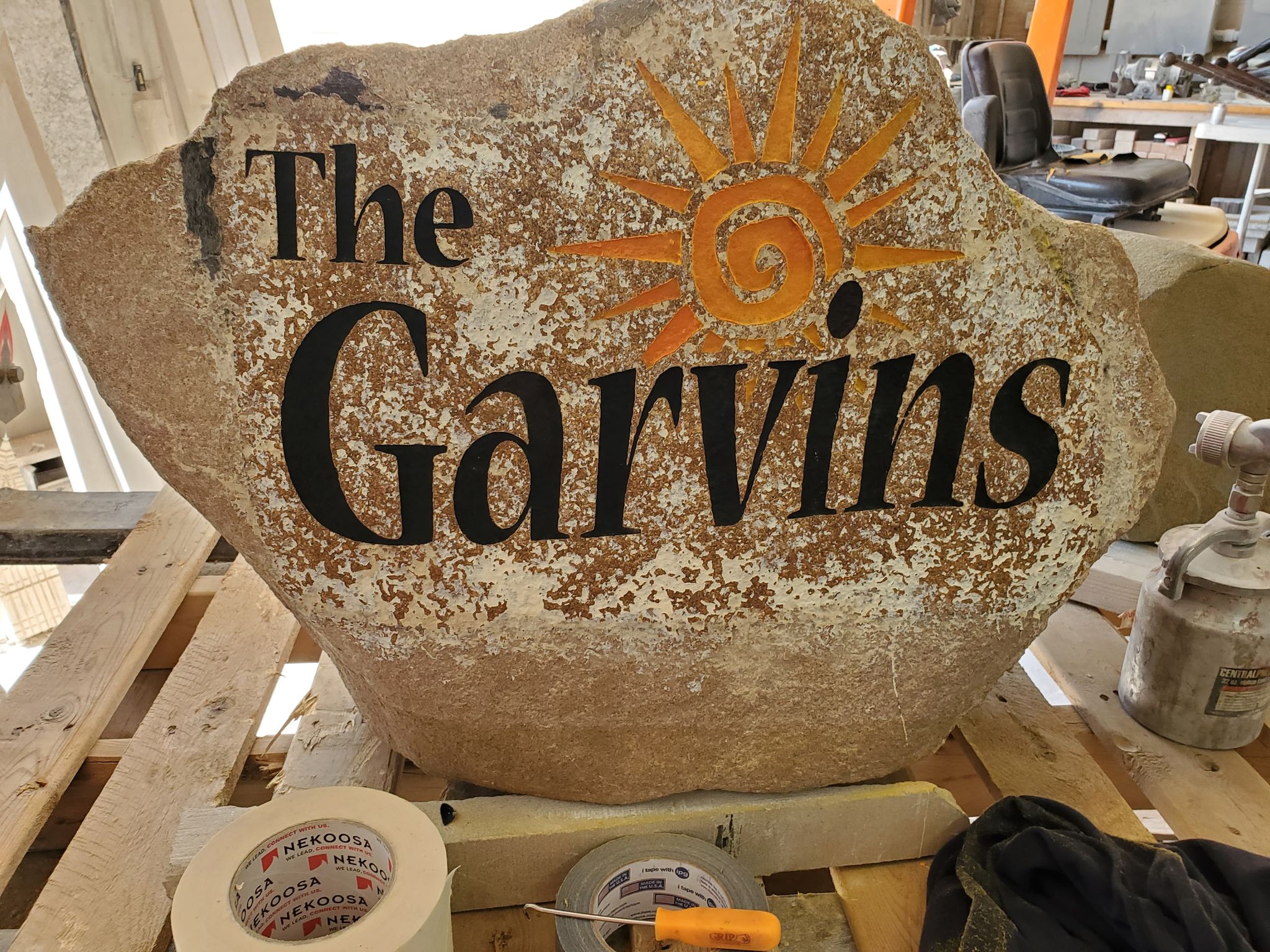 A name set in natural stone
